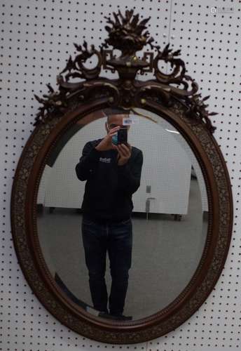 A 19th century Dutch oval mirror,