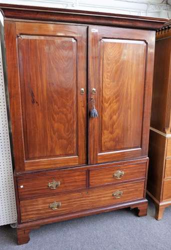 A George III mahogany hanging cupboard,