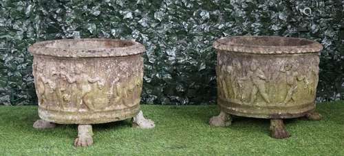 A pair of reconstituted stone circular jardinieres,