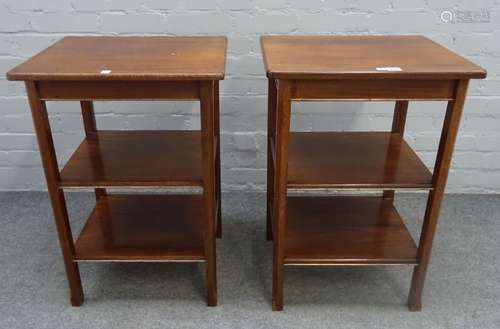 A pair of brass mounted mahogany three tier occasional tables, on canted square supports,