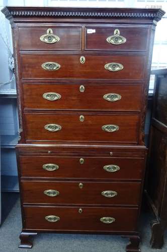 A George III mahogany chest on chest with two short over six long graduated drawers divided by