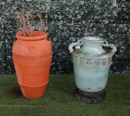 A terracotta oil jar with shell handles, 50cm diameter x 80cm high,