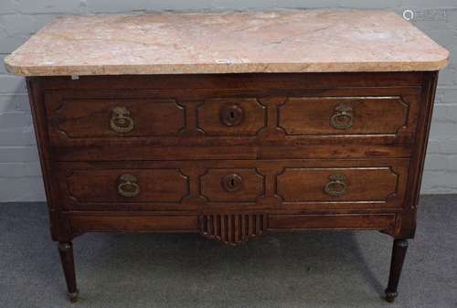 An 18th century French commode, the marble top over two long drawers on turned supports,