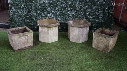 A pair of reconstituted stone octagonal planters, 53cm wide x 40cm high,