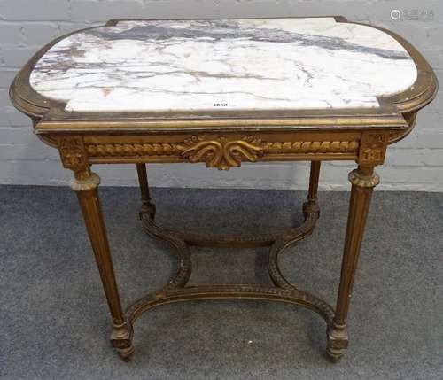 A late 19th century French centre table, the marble inset top, on four fluted gilt supports,