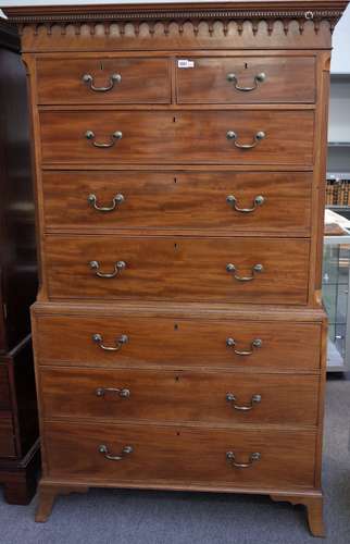 A George III mahogany chest on chest, with two short over six long graduated drawers,