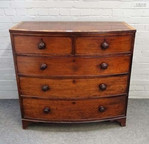 An early Victorian fruitwood banded mahogany bowfront chest of two short and three long graduated