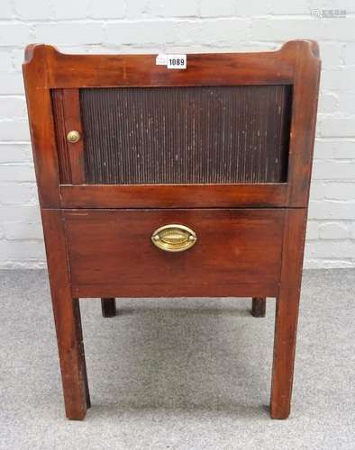 A George III mahogany tray top night commode, with tambour panel over pull-out, on square supports,