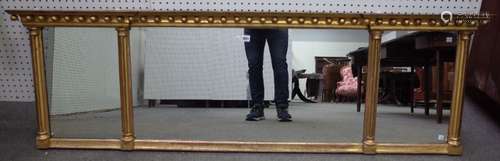 A Regency style gilt framed overmantel mirror with inverted ball mounted frieze,