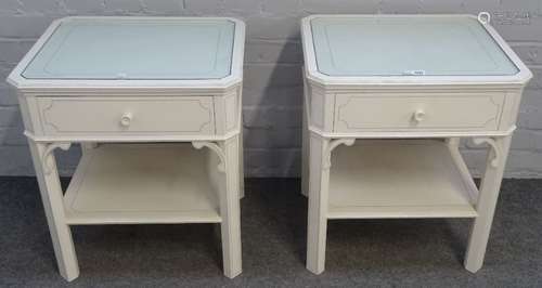 A pair of 18th century style white painted two tier occasional / bed side tables,