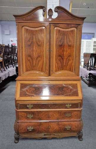 A Dutch 18th century style figured walnut bureau bookcase,