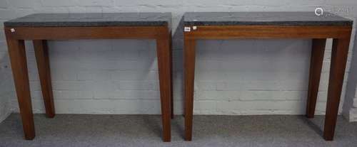 A pair of modern consoles each with rectangular polished marble tops on four tapering hardwood