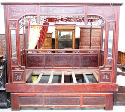 An early 20th century Chinese enclosed opium bed,