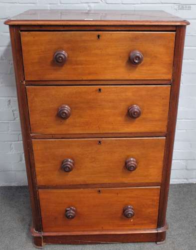 A tall and narrow Victorian mahogany chest with four long graduated drawers on plinth base,