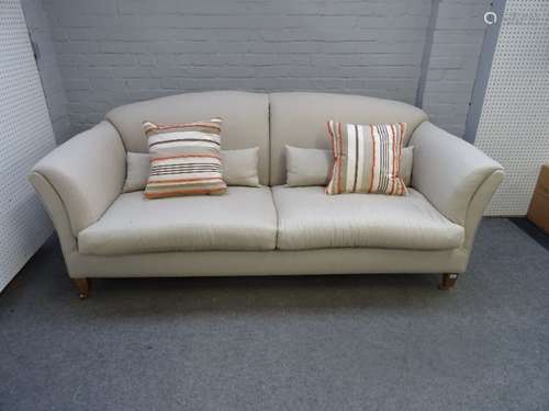 A modern double hump back sofa on tapering square beech supports, 220cm wide x 95cm high.