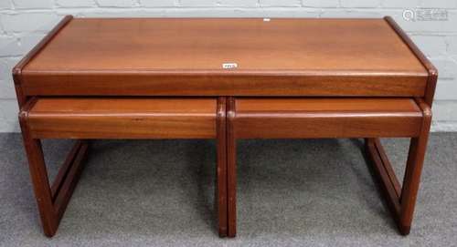 Probably G-Plan, a nest of three teak occasional tables, the largest, 96cm wide x 43cm high, (3).