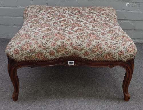 A late 19th century French walnut framed lozenge shape footstool, on shell capped cabriole supports,