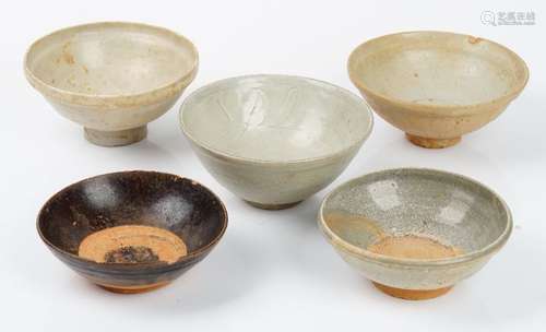 A group of five Asian monochrome pottery bowls,