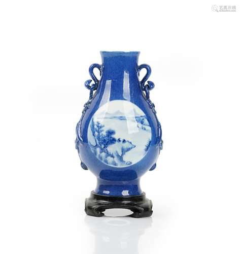 A Chinese powder blue-ground pear shaped two-handled vase, blue Qianlong seal mark but later,