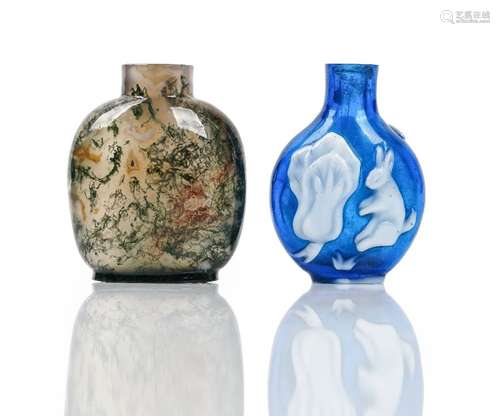 A Chinese white overlay blue glass snuff bottle, each side with a rabbit and vegetable,