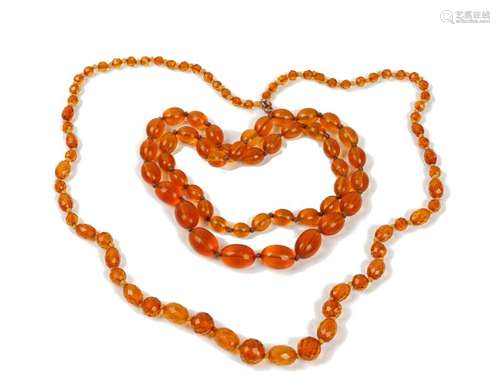 An amber necklace, formed of faceted oval and circular beads,