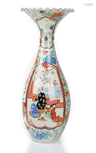 A tall Japanese Imari vase, Meiji period, slender baluster form with frilled rim,