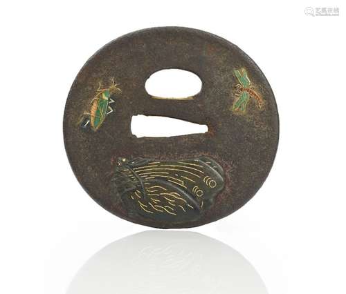 A Japanese oval iron tsuba, Edo period ,19th century,