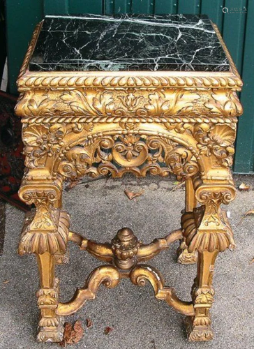 A GILDED WOOD CONSOLE