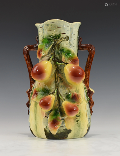 A MOJOLICA VASE WITH PEARS