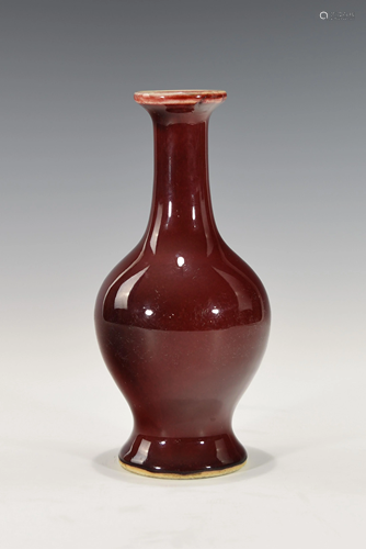 A CHINESE OX-BLOOD RED VASE, QING DYNASTY (1644 - …