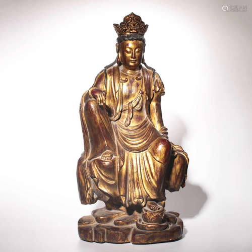 A Nanmu Gold Lacquered Guanyin Statue