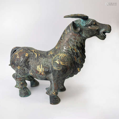 A Gilt-bronze Ox Ornament