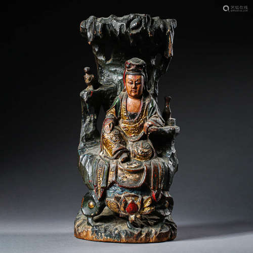 A Wood Carved Seated Guanyin Statue