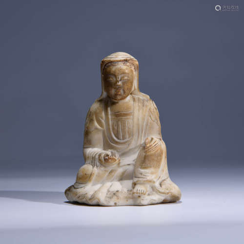A CHINESE CARVED STONE GUANYIN STONE
