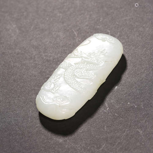 A WHITE JADE DRAGON PENDANT