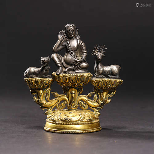 AN GILT-BRONZE MILAREPA STATUE