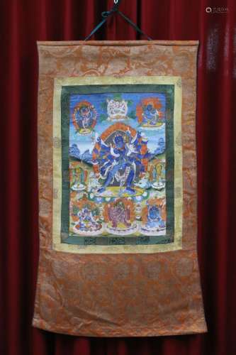 TIBET - 20 c.唐卡，画布上的蛋彩画，Chakrasamvara站在恶魔身上，与他的Sakti在yab-yum中拥抱，周围是凶猛的神灵。   高度58.5，宽度40.5厘米。