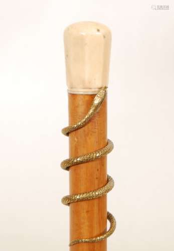 拐杖象牙柄。饰有医仙草。法国，20年代，L. 85 cm.