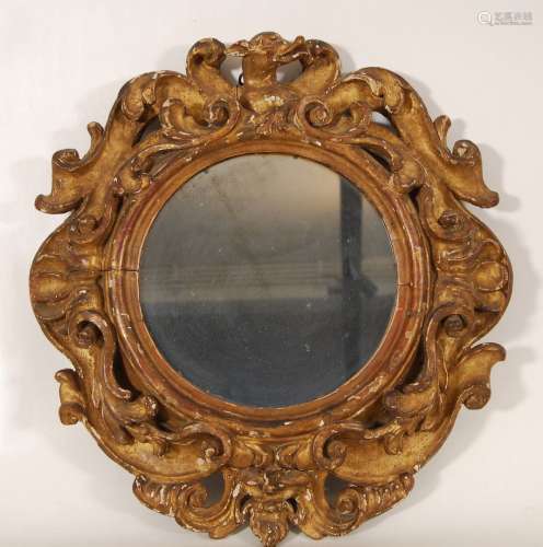 圆镜雕花镀金木。路易十五风格。55 x 53 厘米。