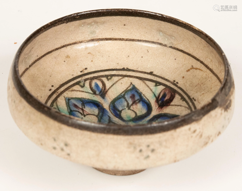 AN EARLY PERSIAN EARTHENWARE FOOTED BOWL H 3