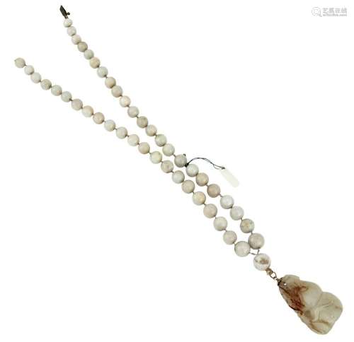 A Chinese White Jade Pendant and Beaded Necklace