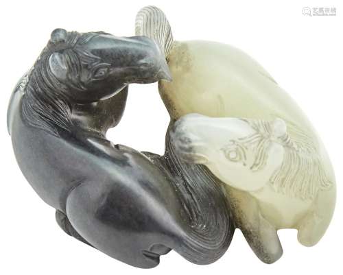 A Chinese Black and White Jade Horse Grouping