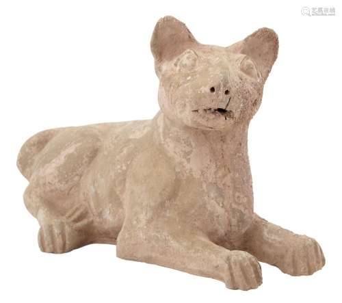 A Chinese Pottery Figure of a Recumbent Dog