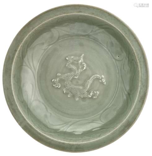 A Chinese Carved and Molded Longquan Celadon Dragon Dish