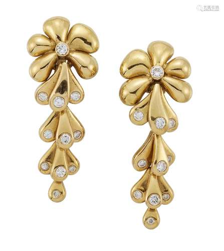 A pair of diamond-set earrings, composed of flowerhead tops to graduated flexible leaf design