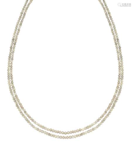 A diamond necklace, composed of two rows of slightly graduated faceted diamond beads, 41.0cm