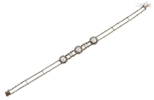 An early 20th century pearl and diamond bracelet, the front composed of three pearl and old-cut