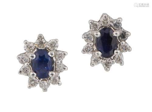 A pair of sapphire and diamond earstuds, each oval sapphire single stone within a brilliant-cut