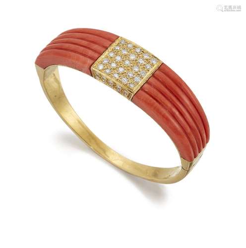 A coral and diamond bangle, of hinged half-hoop design, the central brilliant-cut diamond square