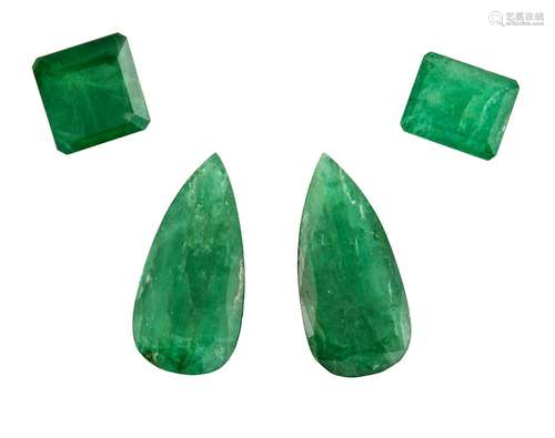 A group of four unmounted emeralds, comprising: two pear-cut, total weight approximately 15.60